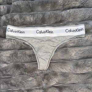 Calvin Klein Light Gray Thong with Logo Waistband and Soft Stretchy Material